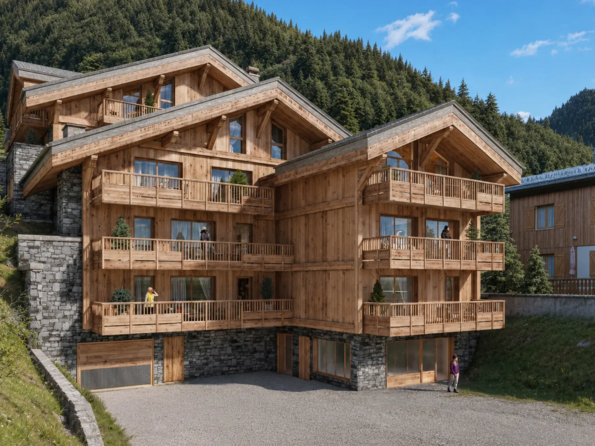 Perspective extérieure de la résidence Chalet Naya à Champagny-en-Vanoise en été